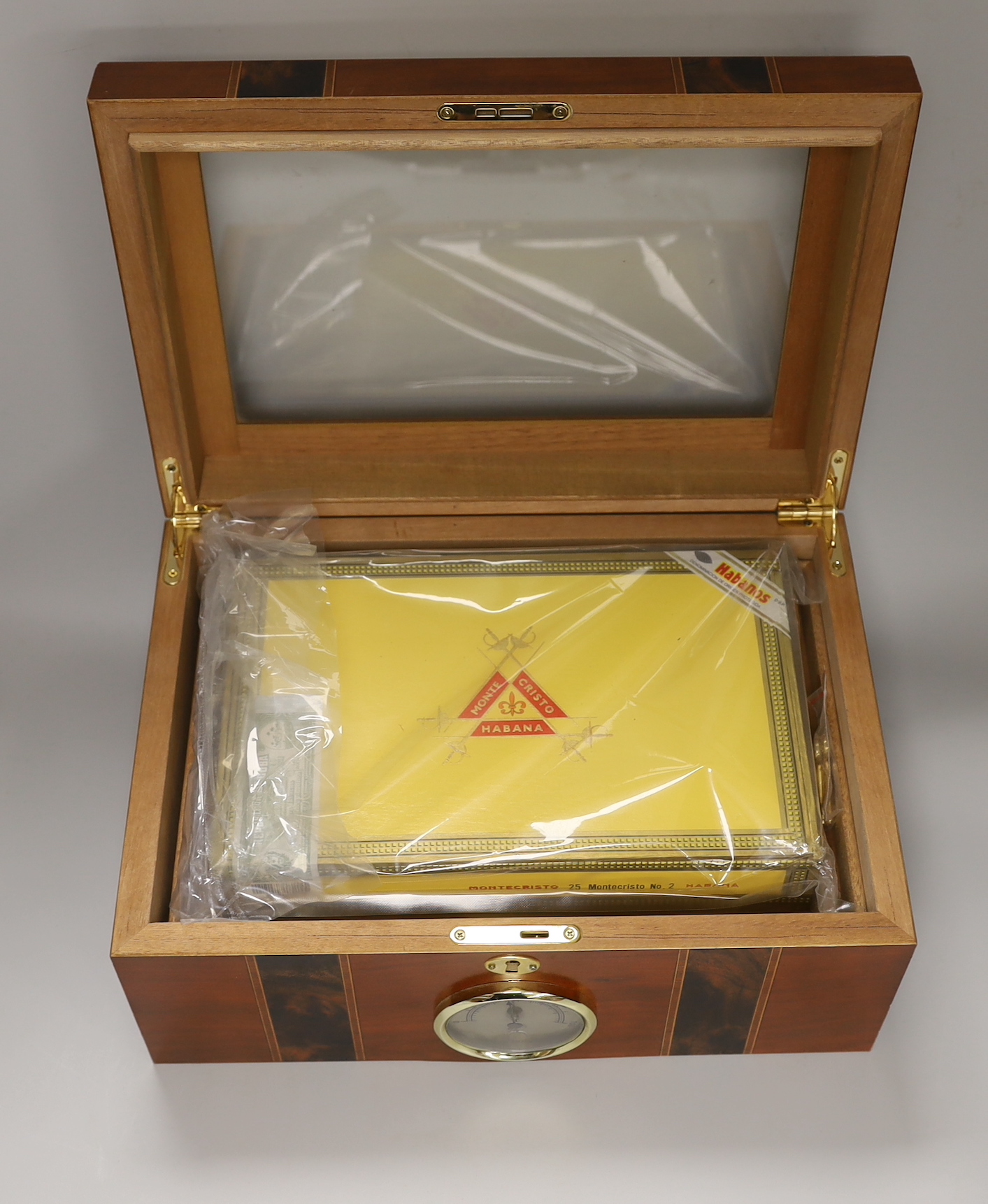 A sealed case of Monte Cristo Habana cigars together with a humidor, the humidor 16cm high x 34.5cm wide